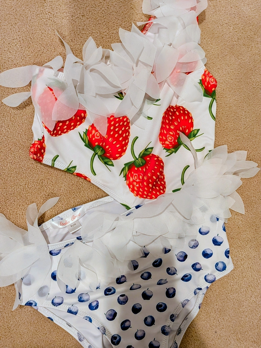 Stella Cove White Swimwear with Coral Logo and Blue Floral Trim